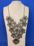 Metal Filigree Bib Necklace – About 19” long with a 5 1/2” drop
