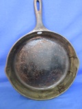 Cast Iron Skillet – Marked 11 1/4” Skillet Made in USA on the bottom appx 16 3/4”  across