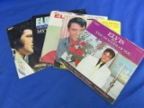 5 Elvis 45's in Sleeves