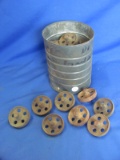 25 Cast Iron Wheels in a tin – weights 5 ¾ pounds – 2” diameter