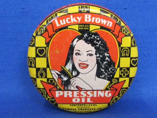 “Lucky Brown Hair Pressing Oil” Tin – Black Americana – Copyright 1938 – 2 3/4” in diameter