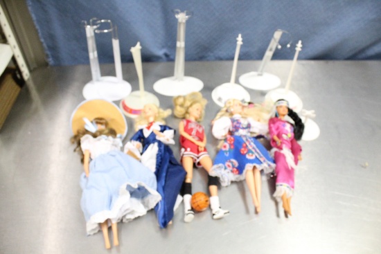 Lot of Barbie Dolls and Stands