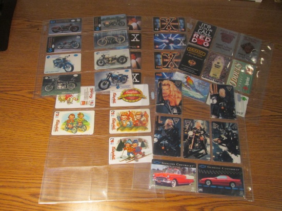 36 1990's Collectible Phone Cards  in plastic pages