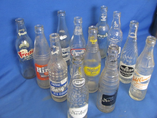 12 Vintage Pop Bottles 9 ½” Tall