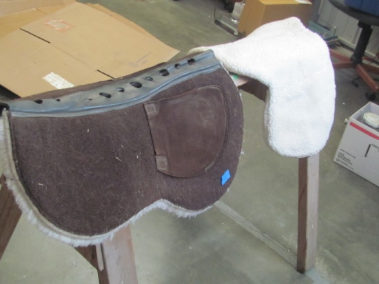 2 Half Pads of different styles – one brown and one white fleece (Miller's Roma Equi-Fleece)