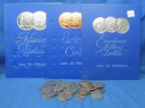 32 Eisenhower Dollar Coins and three collector books