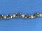 Sterling Silver Tennis Bracelet with Dark Blue Stones – 7 1/2” long – 12.4 grams