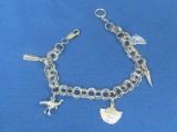 Sterling Silver Charm Bracelet w Some Interesting Charms – 8 1/4” long – 17.6 grams