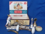 Cigar Box with Various  Items: Pet Cap Gun, White Porcelain Doorknobs, Folding Ruler