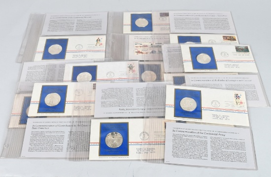 12- SILVER MEDALS w/ FIRST DAY ISSUES 9.5ozt
