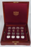 1995 OLYMPIC 32 COIN SET 2ozt GOLD & 20ozt SILVER