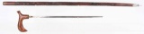 CARVED WOOD SWORD CANE
