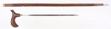CARVED WOOD SWORD CANE