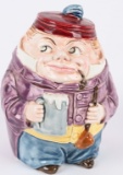 LARGE CHARACTER TOBACCO JAR RICH FAT MAN W/ PIPE
