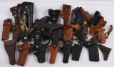 LOT (24) HOLSTERS WITH SLINGS, AMMO POUCHES ETC