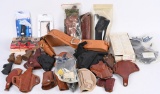 LARGE LOT OF HOLSTERS & GRIPS