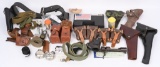 LOT OF VARIOUS HOLSTERS, SLINGS AND PISTOL PARTS