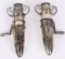 MATCHING PAIR OF ORNATE SILVER CAR VASES