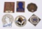 6-Enameled Foreign Radiator Badges