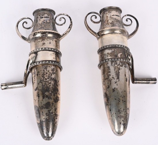 MATCHING PAIR OF ORNATE SILVER CAR VASES
