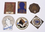 6-Enameled Foreign Radiator Badges