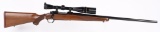 RUGER M77 HEAVY BARREL RIFLE WITH LEUPOLD SCOPE