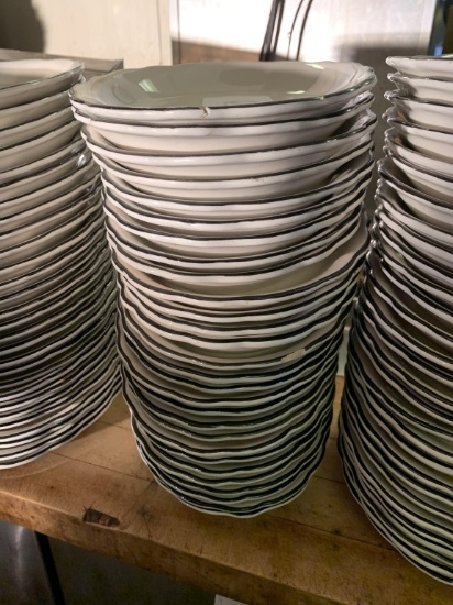 (29) 9.5" OVAL BLACK RIM PLATES