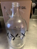 (6) .5GAL GLASS BOTTLES WITH LIDS
