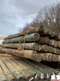 4X7 PRESSURE TREATED POSTS-APPROX 28 IN BUNDLE