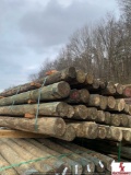 4X7 PRESSURE TREATED POSTS-APPROX 28 IN BUNDLE
