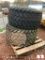 (2) FIRESTONE 21.5X16.1 TURF TIRES & RIMS