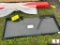 UNUSED SKIDSTEER PLATE.