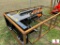 UNUSED SKIDSTEER TRENCHER.