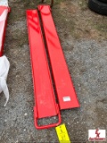 UNUSED PALLET FORK EXTENSION SET