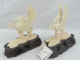 A pair of Pegusus like winged horses carved from Woolly Mammoth tusk segments