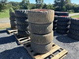 12-16.5 TIRES ON BIG HOLE BOBCAT WHEELS