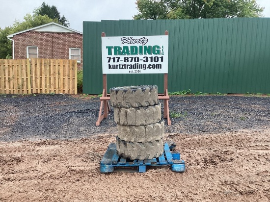 (4) 12" SOLID SKID STEER TIRES & WHEELS