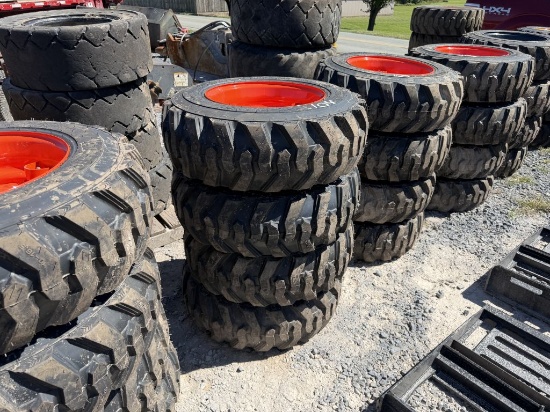 NEW 10-16.5 TIRES ON BOBCAT WHEELS