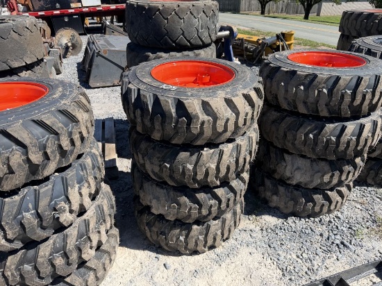 NEW 10-16.5 TIRES ON BOBCAT WHEELS