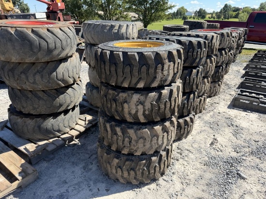 NEW 12-16.5 TIRES ON CATERPILLAR WHEELS