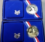 2x 1986 Silver Liberty Commemorative Dollars (a)