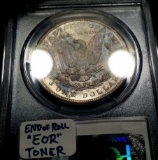 1899-O Morgan Silver Dollar -EOR TONED