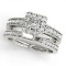 14KT White Gold 1 ct Halo Engagement & Wedding Ring Set with J-L color and SI1/SI2 clarity diamonds.