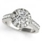 14KT White Gold 1 3/4 ct Halo Engagement Ring with G-H color and I1-/I2+ clarity diamonds.