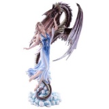 FAIRY WITH DRAGON RISING 12 3/8in. x 10 1/4in. x 21 1/2in.