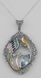 Filigree Enamel Bird Pendant w/ 3 Carat Blue Topaz - Sterling Silver