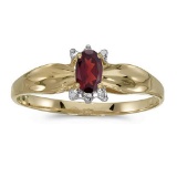 Certified 10k Yellow Gold Oval Garnet And Diamond Ring 0.24 CTW