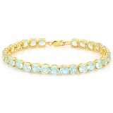 27 CT CREATED SKY BLUE TOPAZ 925 STERLING SILVER TENNIS BRACELET WITH GOLD PLATED IN ROUDN SHAPE