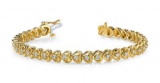 14K YELLOW GOLD .90 CTW G-H VS2/SI1 FLOATING DIAMOND HEART BRACELET