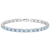 7.95 CT SKY BLUE TOPAZ 925 STERLING SILVER TENNIS BRACELET IN OVAL SHAPE